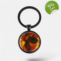 Baltic amber keychain with presse..