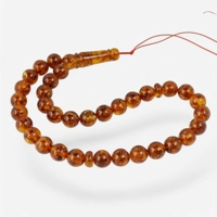 Pressed Amber Rosary – A Meaningf..