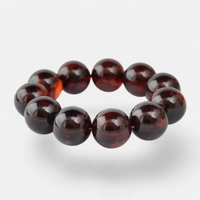 18mm round pressed amber bracelet..
