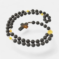 Pressed amber necklace with cross..