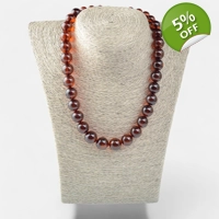 Pressed 10 to 14mm amber beads ne..