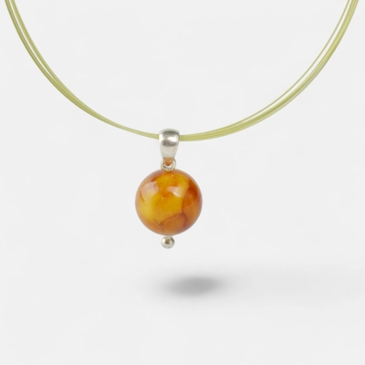 Pressed amber pendant with silver 15mm beads Pressed amber pendant with silver 15mm beads