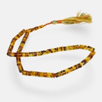 Pressed Amber rosary can symboliz..