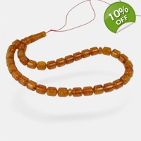 Cognac amber rosary with pressed ..