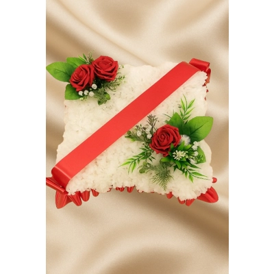 "Red cushion Funeral Tribute with Artificial Roses – Elegant Memorial Cushion Arrangement"