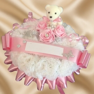 Pink funeral teddy bear..