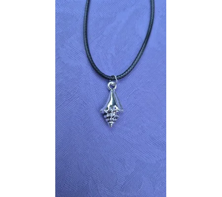 Conch shell style necklace on a 45cm black cord necklace with lobster clasp