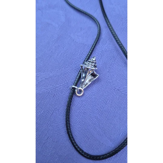 Conch shell style necklace on a 45cm black cord necklace with lobster clasp