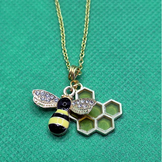 Bee on honeycomb necklace