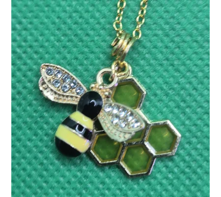 Bee on honeycomb necklace