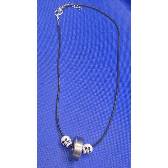 Skateboard Bearing and Skull on black cord necklace A rad piece from Xhale