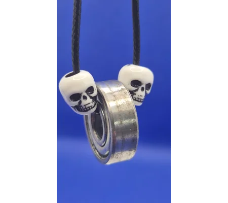 Skateboard Bearing and Skull on black cord necklace A rad piece from Xhale