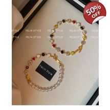 Pearl Colored Zirconium Ston..