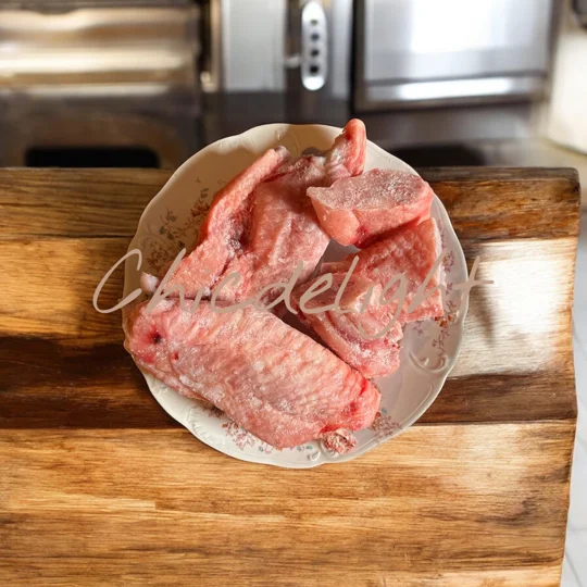 A plate containing mid wing turkey, Turkey, Frozen Turkey