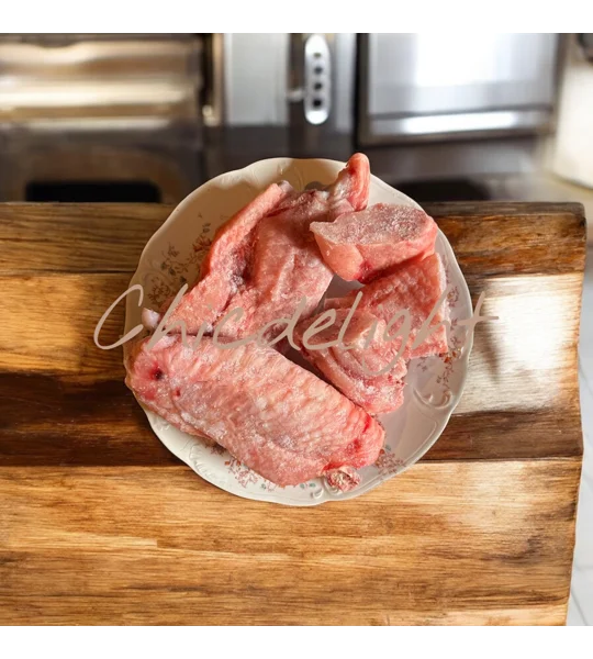 A plate containing mid wing turkey, Turkey, Frozen Turkey