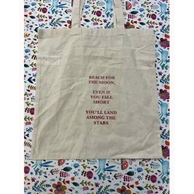 reach for the moon tote bag