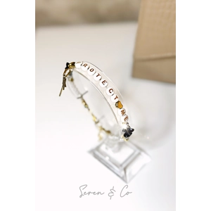 The Dark Matter Charm bracelet (Black Obsidian & Clear Quartz)