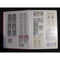 E Germany DDR used stamps 1973-1984 in 32 page/64 side stock book