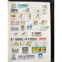 W Germany 1980-1994 mnh & used stamps in 32 page/64 side album with duplication