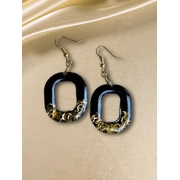 Elegant Black Earrings with Gold Accents