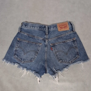 Levi's 501 Cutoff Jean Shorts Women's 25x2.5 Blue Medium Distressed Frayed Denim