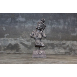 Decorative cement relief on a stand with Hindu goddess Dewi Sri carving.