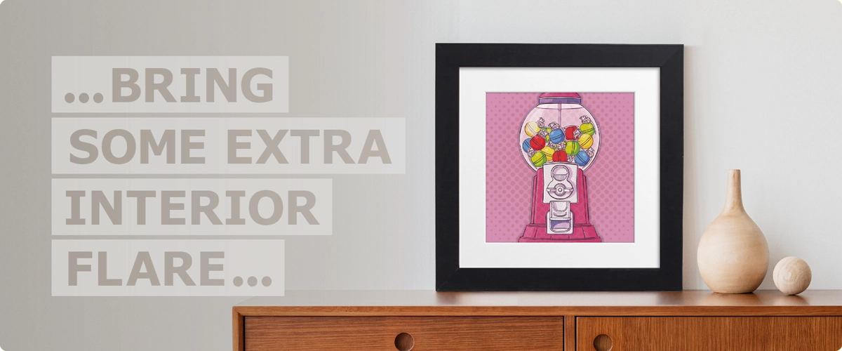 Framed Troublegum Machine popart sitting on top of a contemporary sideboard next to text wording that reads ‘bring some extra interior flare’.