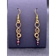 Golden Swirl Garnet Earrings