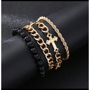 Four gold & black tone bracelets for men