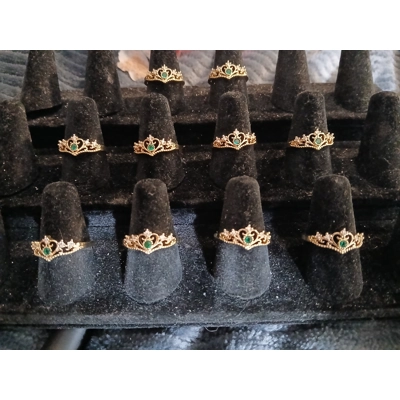 Ten Princess Crown Rings With Green Emeralds