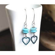 These silver dangle earrings feature sky blue Czech saucer beads, Bali sterling silver spacers and adorable Victorian style brass hearts. To highlight the hearts I added a vivid blue glaze with a protective coating and they all hang from classic style earwires.  Pair these pretty earrings with a summer dress or a classic white tshirt and jeans.

*** All wire is Argentium Sterling Silver which is highly tarnish resistant and more pure than traditional sterling silver (935 vs 925) and made using recycled silver.

MEASUREMENTS: The total length of these pretty, flirty earrings is 2