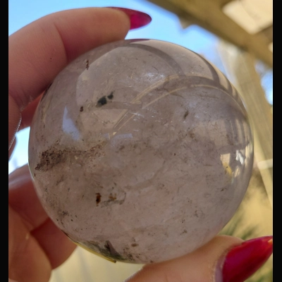 Black rutilated quartz sphere