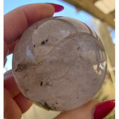 Black rutilated quartz sphere