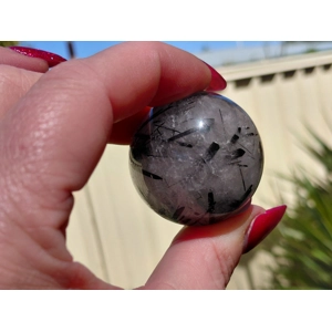 High quality black rutilated quartz sphere