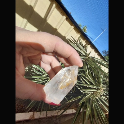 Clear quartz with golden healer generator