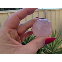 Small rose quartz sphere