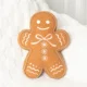 Sugarplum Bakery Gingerbread Man Boucle Cushion