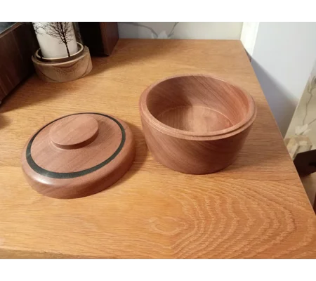 Hand turned lidded box with black epoxy resin inlay