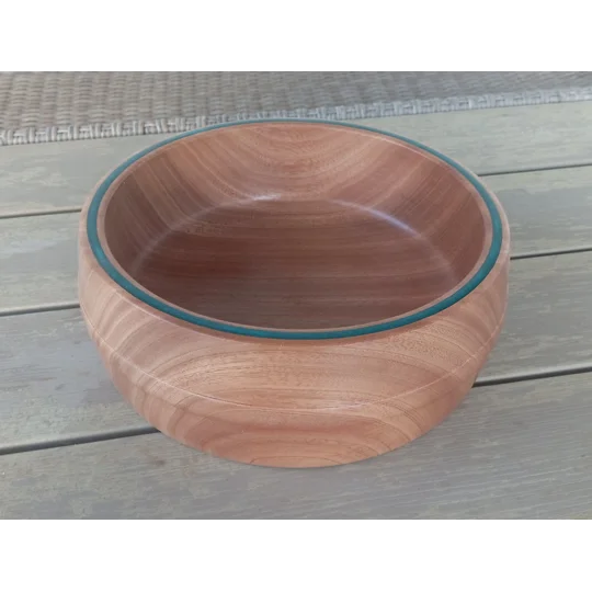 Red hardwood hand turned fruit bowl with emerald green inlay