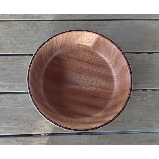 Red hardwood hand turned fruit bowl with purple inlay
