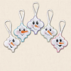 Five embroidered Arabesque Snowman Christmas decorations with different expressions and coloured stitched borders