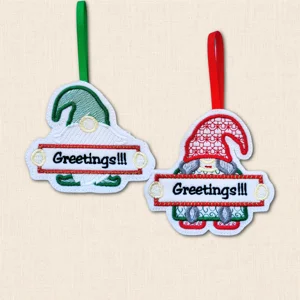 Male and female Greetings Gnome Christmas decorations embroidered on felt with festive red and green details and hanging ribbons