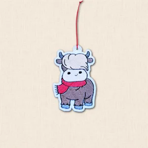 Festive Scarf Highland Cow Christmas Decoration embroidered on white felt with red scarf and red hanging loop