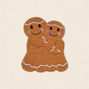 Embroidered Gingerbread Couple Hug decoration showing two smiling felt gingerbread characters embracing