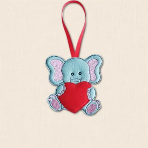 Grey felt elephant hanging decoration holding a plain red heart, with pale pink embroidered ears and foot pads and a red ribbon loop.