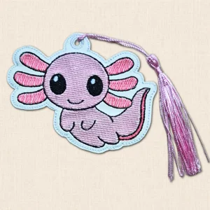 Kawaii Axolotl Bookmark made from white faux leather, embroidered in pink and lilac with frilly gills, smiling face and a matching silky tassel.