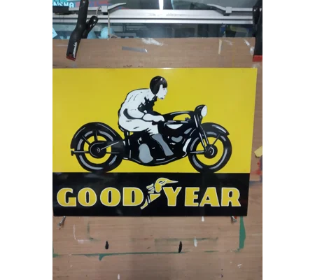 Goodyear man on bike sign