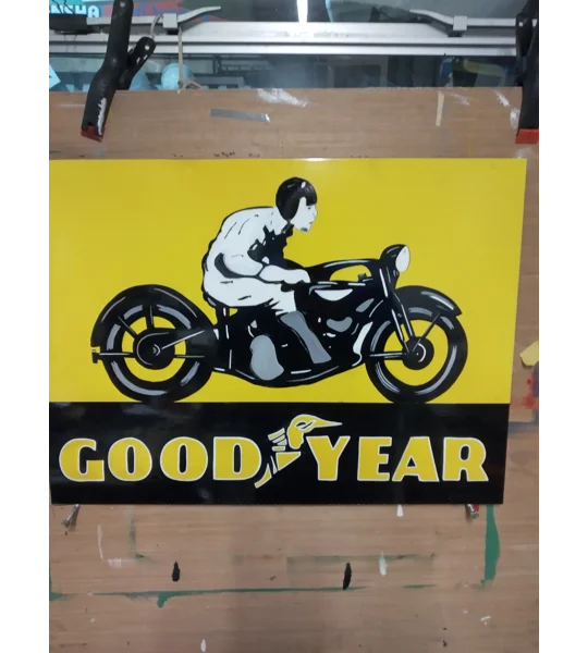 Goodyear man on bike sign