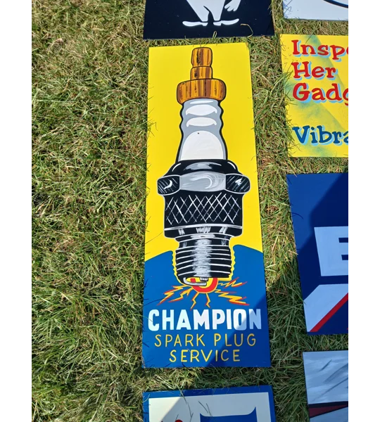 Tall champion plug sign