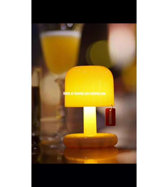 Mini rechargeable sunset night light with compact PC housing and USB charging for romantic bedroom atmosphere and desktop decoration.